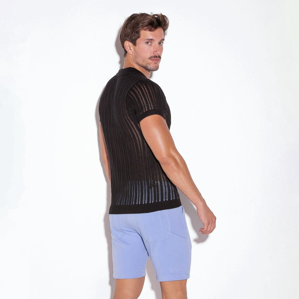 Polo rayé en maille noire