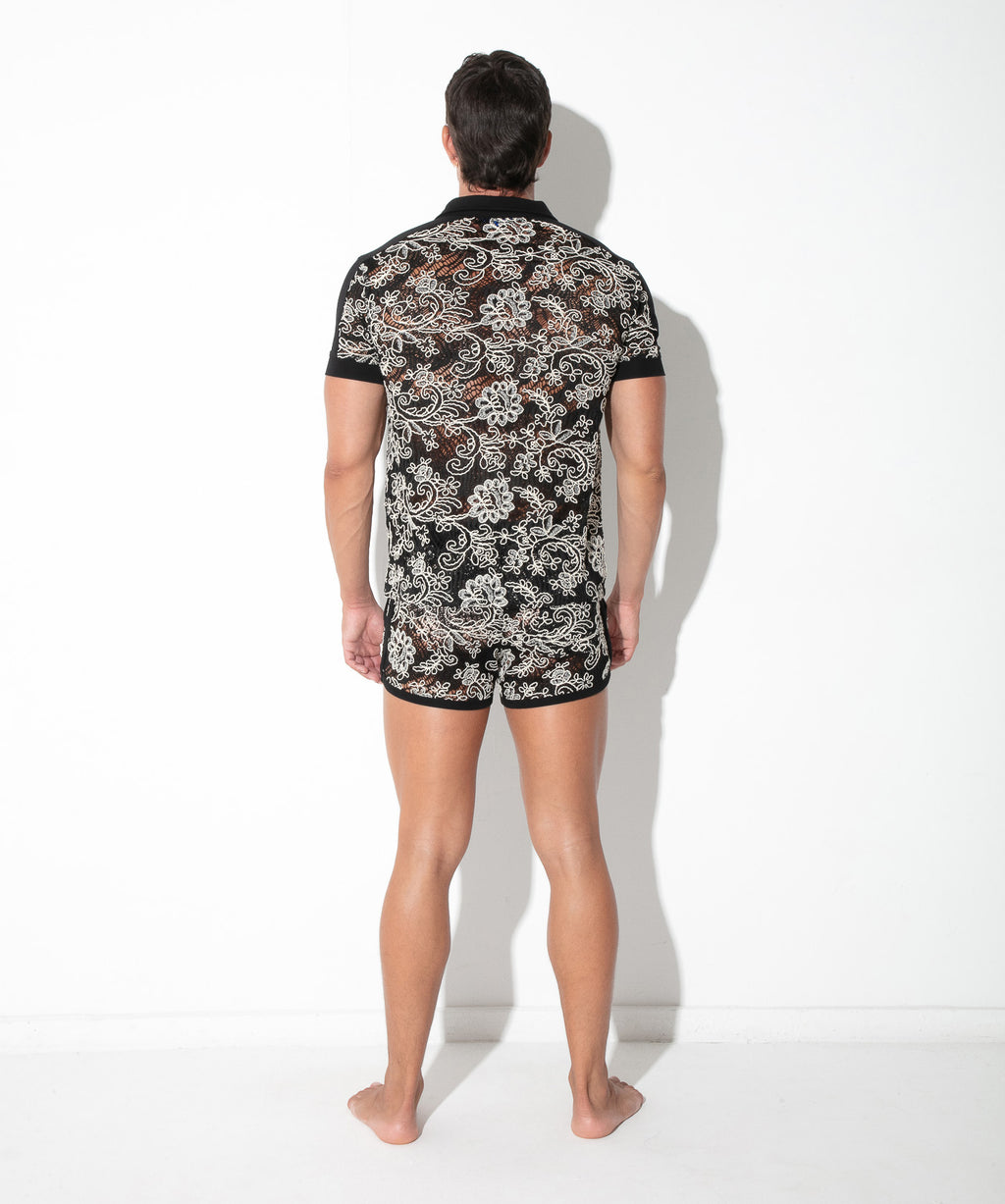 Back view of the black contrast corded lace shirt