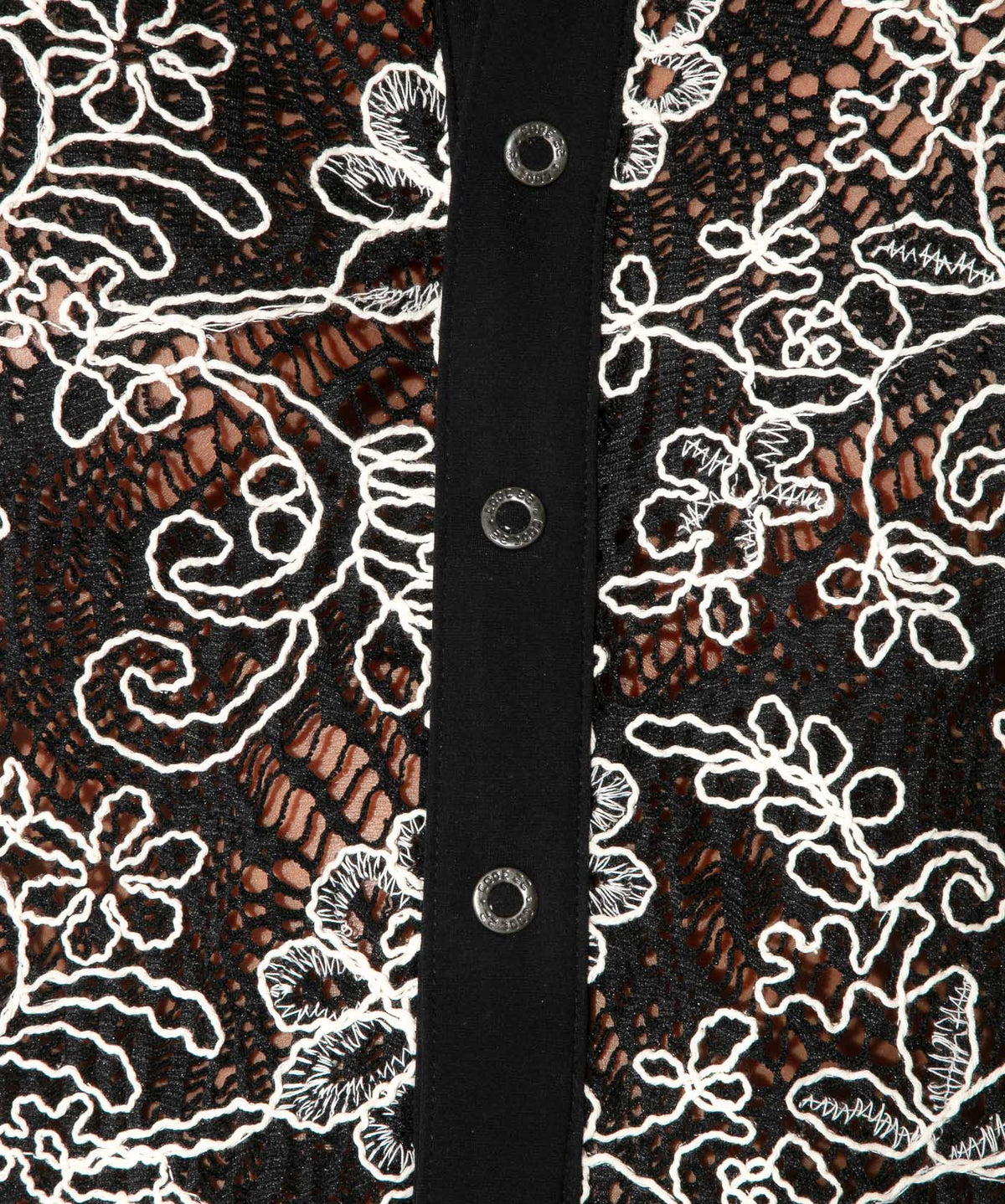 Front detail close-up of the black contrast corded lace shirt